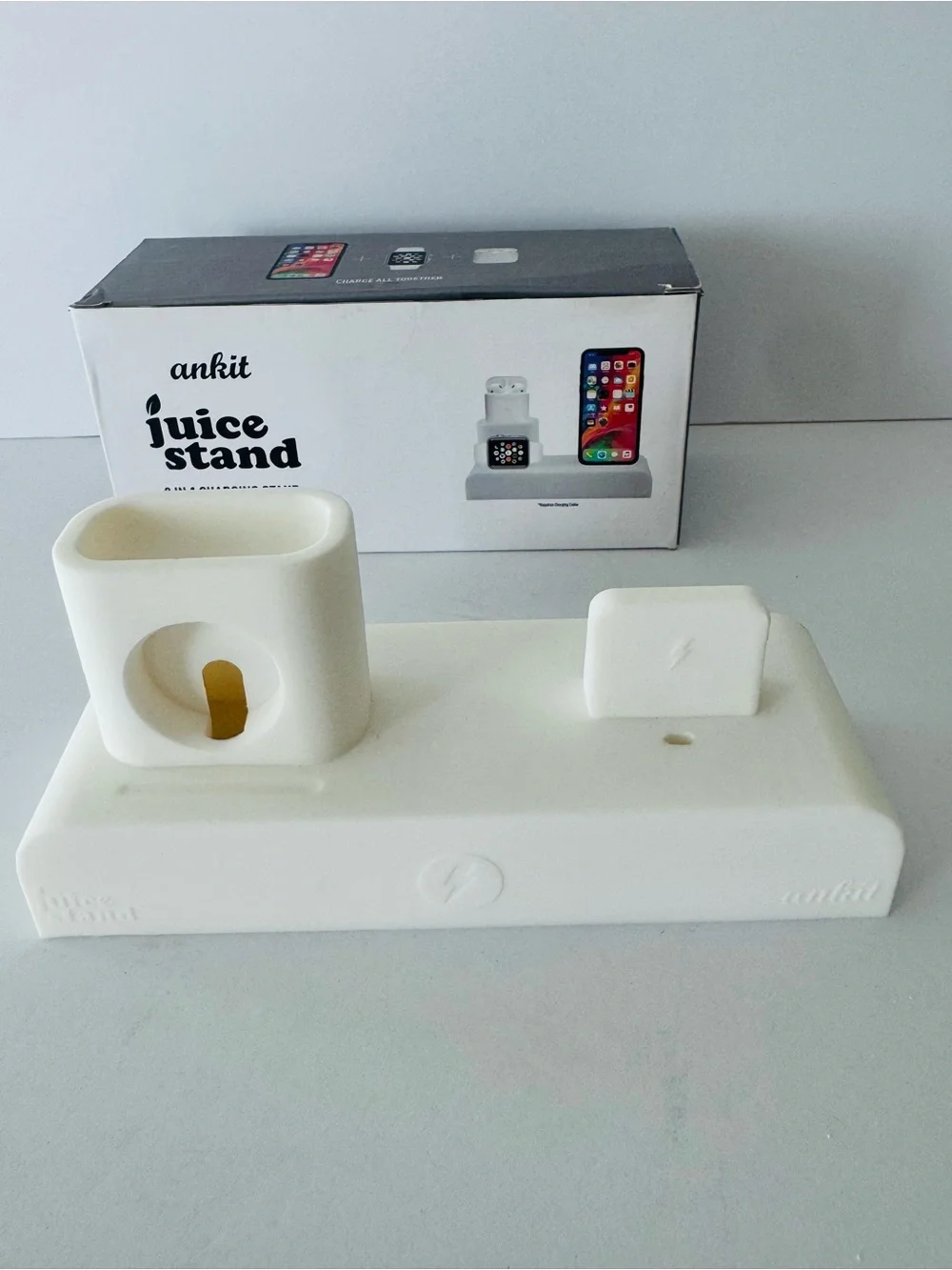 Brand new Ankit Juice Stand 3 in 1 charging dock silicone stand in white.
